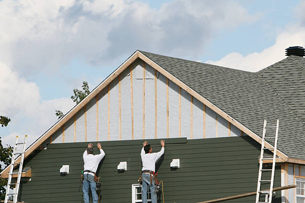 Professional Siding technician working in Wake Forest, NC